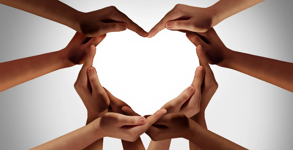 Hands forming a heart shape.