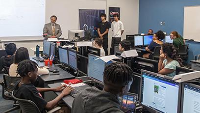 National Cyber Director Harry Coker, Jr., speaking at the Gaucho Security Operations Center (GSOC)