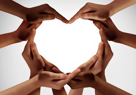 Hands forming a heart shape.