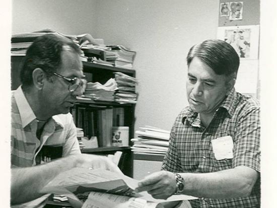 Dr. Joe Griego counseling a student.