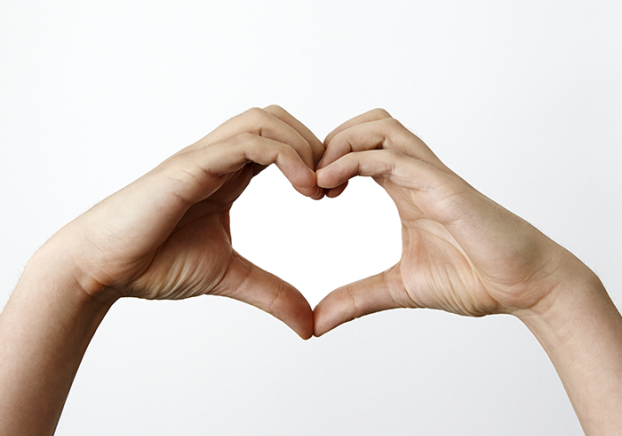 Hands in the form of a heart.